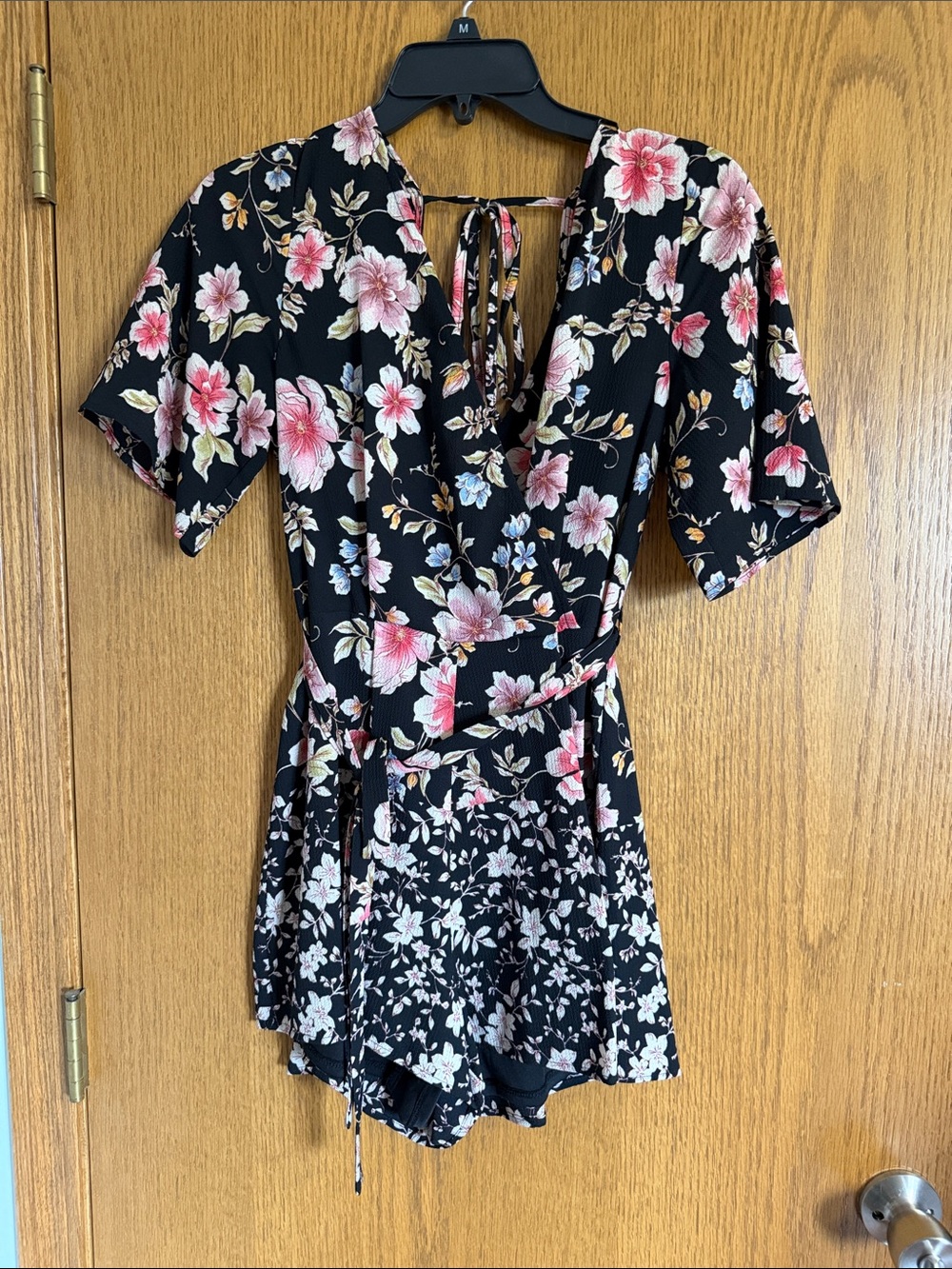 Francesca's Black Romper with Pink Floral Print